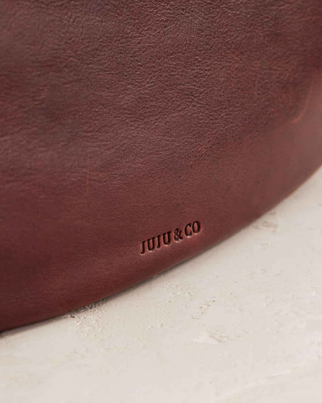 Juju | Crescent Leather Sling Handbag | Maple