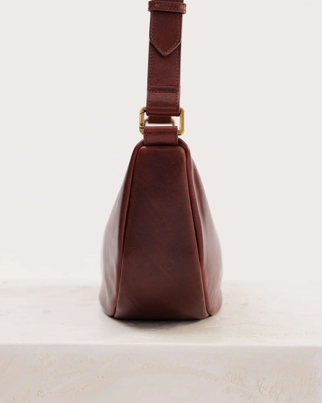 Juju | Crescent Leather Sling Handbag | Maple