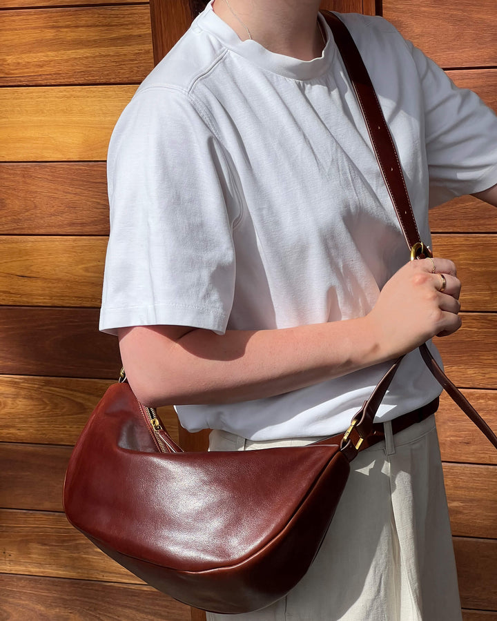 Juju | Crescent Leather Sling Handbag | Maple